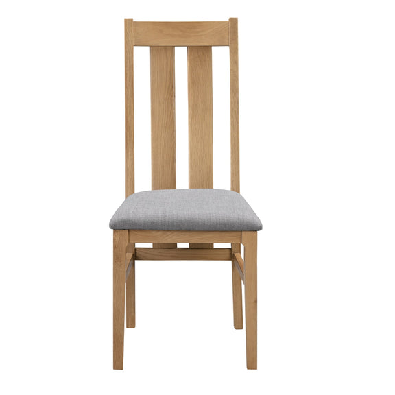 Wooden chair with a gray cushion on a white background