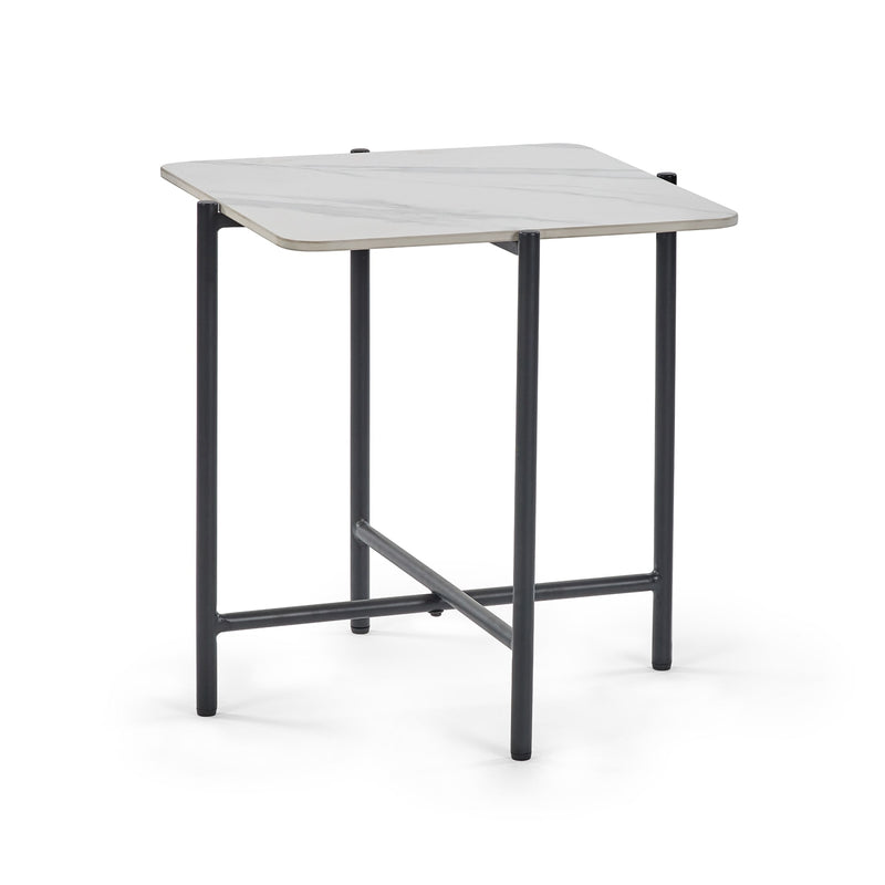 Small table with a white surface and black metal legs on a white background