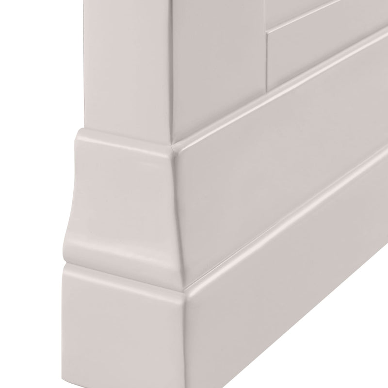 Close-up of a white tiled wall with a subtle pattern