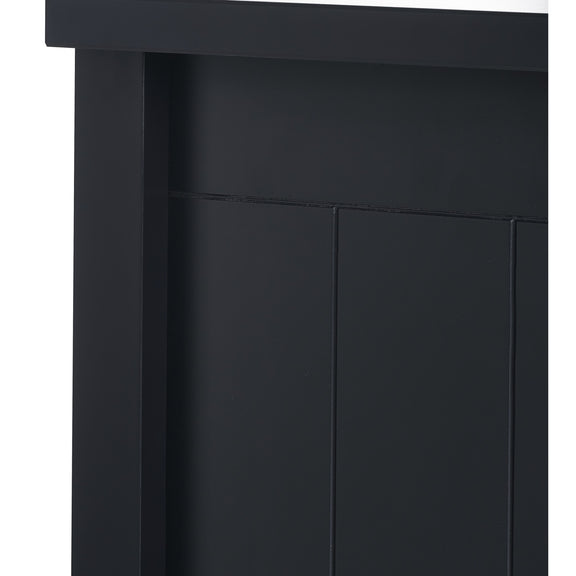 Close-up of a black cabinet door with a white background