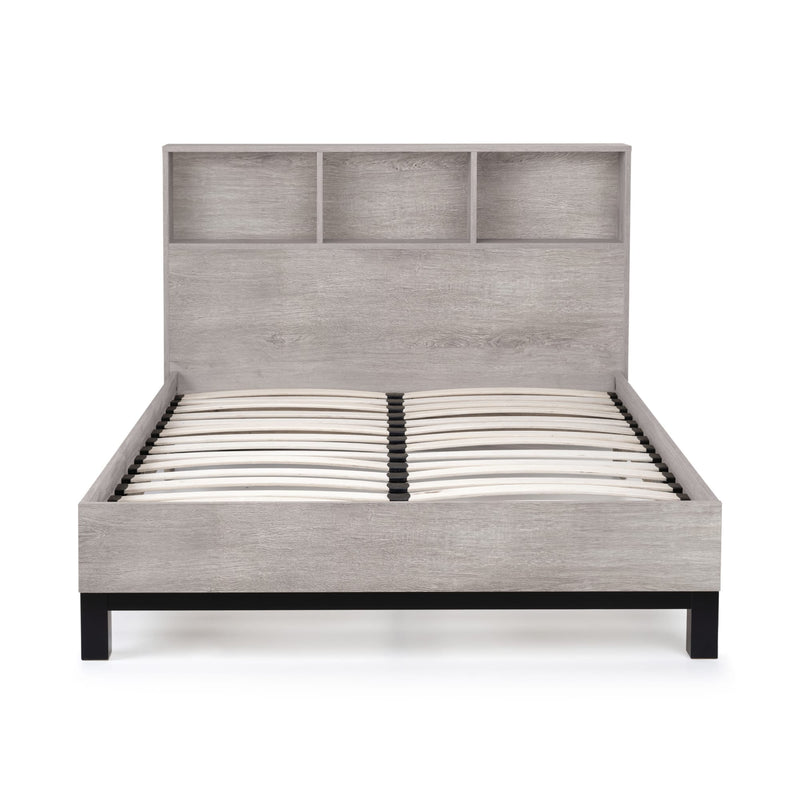 Gray upholstered bed with bookshelf headboard on a white background