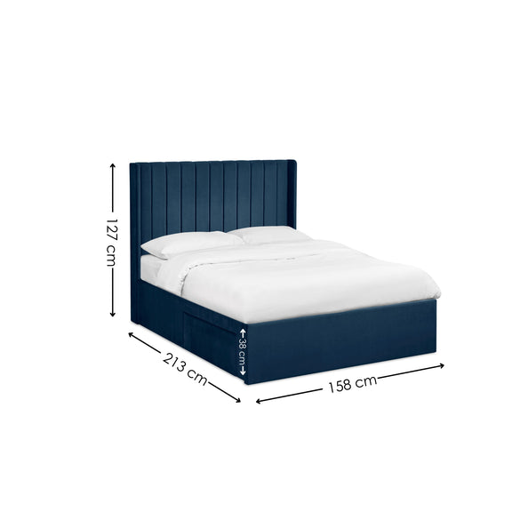 Navy bed frame with white mattress and dimensions on a white background