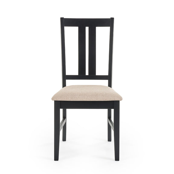 Black wooden chair with a beige cushion on a white background