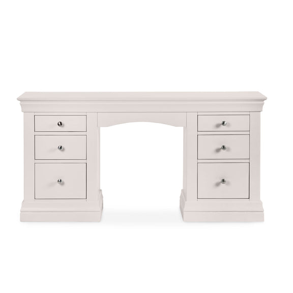 White desk with multiple drawers on a white background