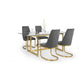 Dining table set with glass top and gold legs, accompanied by four gray chairs on a white background.