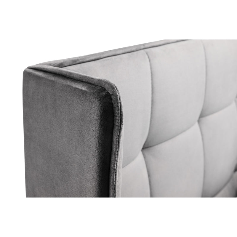Gray upholstered headboard with tufted design on a white background
