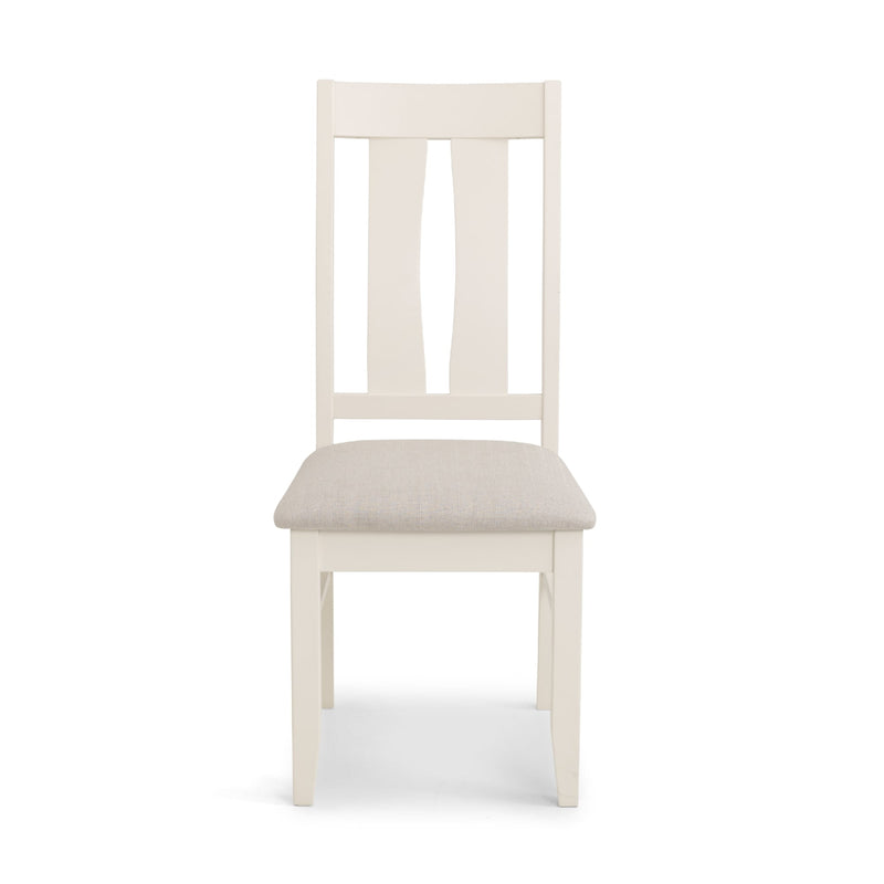 White wooden chair with a beige cushion on a white background