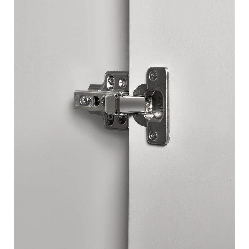 Close-up of a metallic door hinge on a white background
