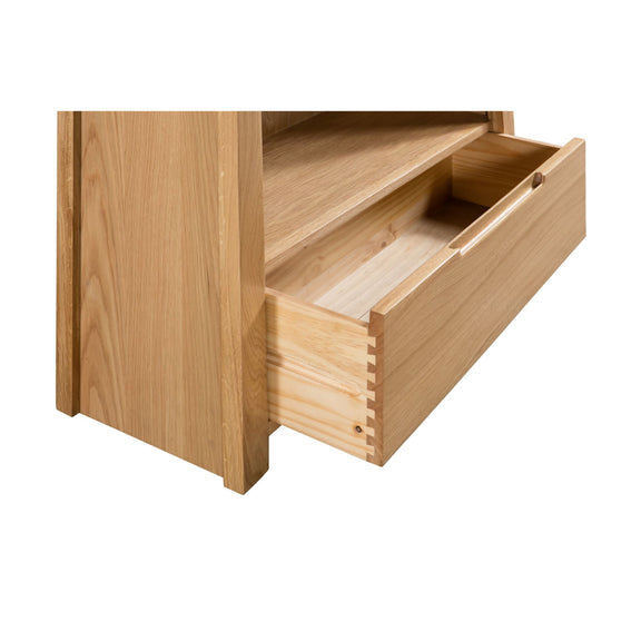 Wooden drawer unit with an open drawer on a white background