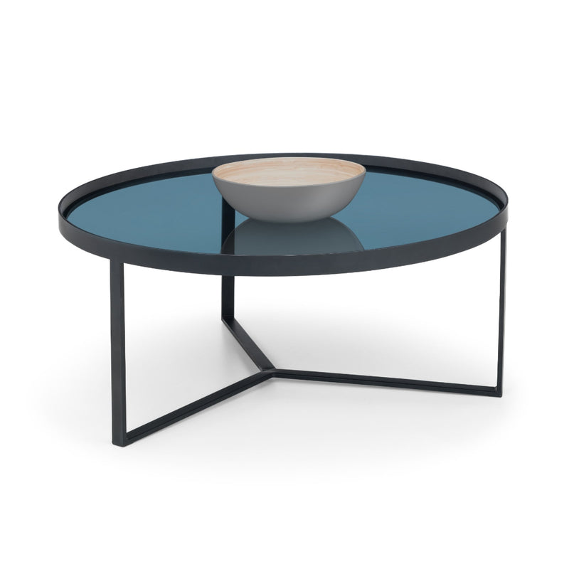 Round glass coffee table with black metal frame on a white background