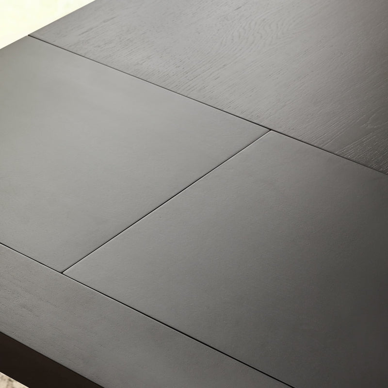 Close-up of a dark gray wooden table surface