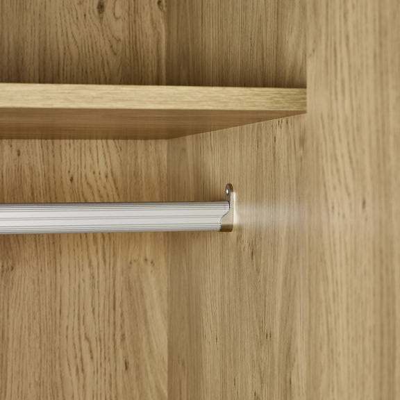 Wooden shelf with a metal bracket on a wooden wall.