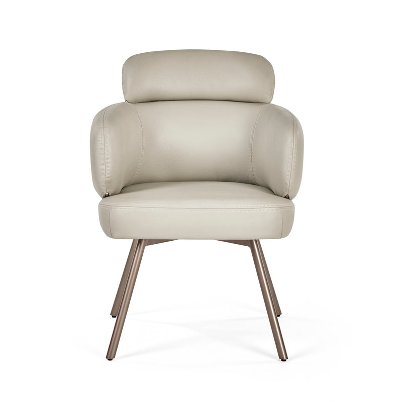 Beige armchair with bronze legs on a white background