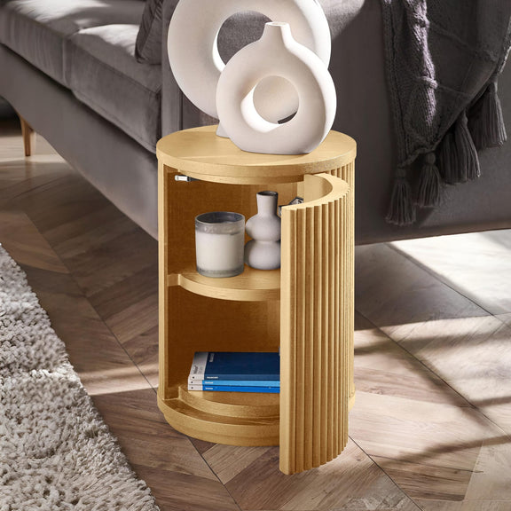 Wooden side table with decorative items in a living room setting