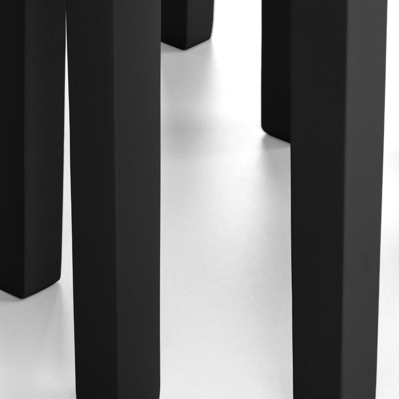 Close-up of black rectangular objects on a white background