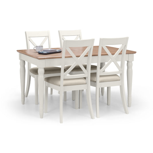 Dining table set with four chairs on a white background