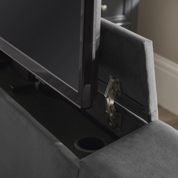 Gray upholstered chair with a built-in TV cabinet and open compartment.