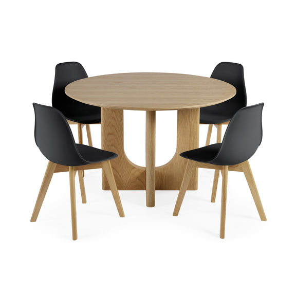 Round wooden table with four black chairs on a white background