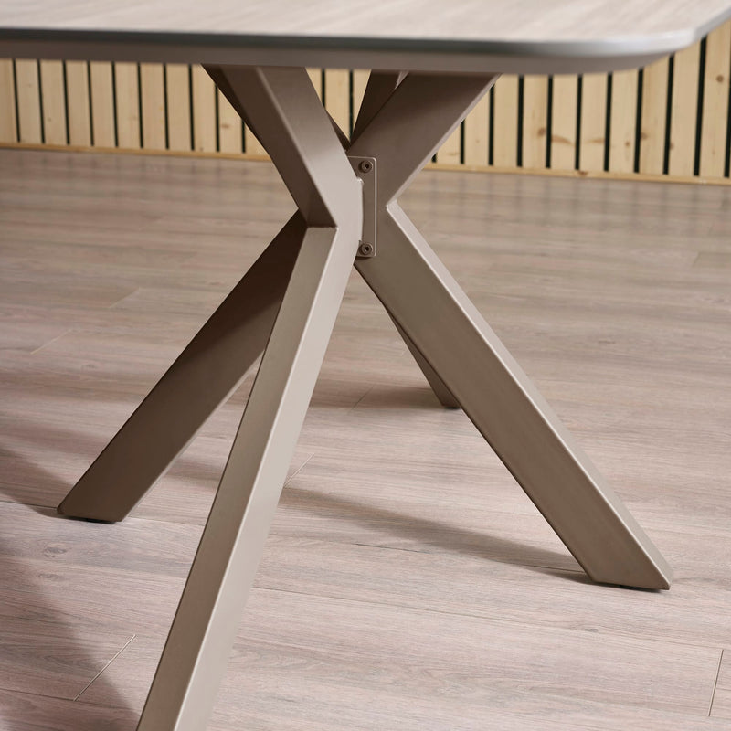Close-up of a outdoor table with metal legs on a wooden deck