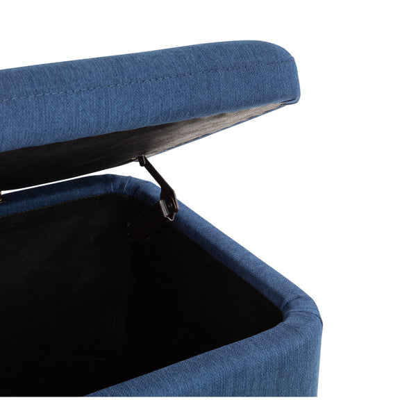 Blue upholstered chair with a cushioned backrest on a white background
