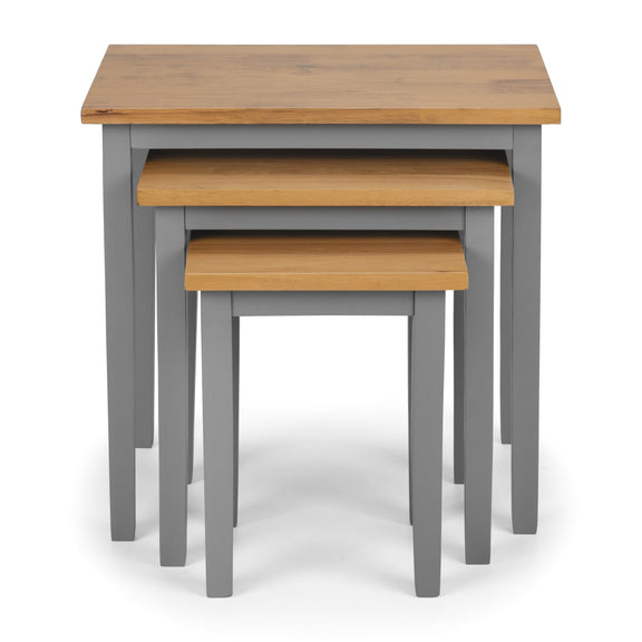 Set of three nesting tables with wooden tops and gray bases on a white background