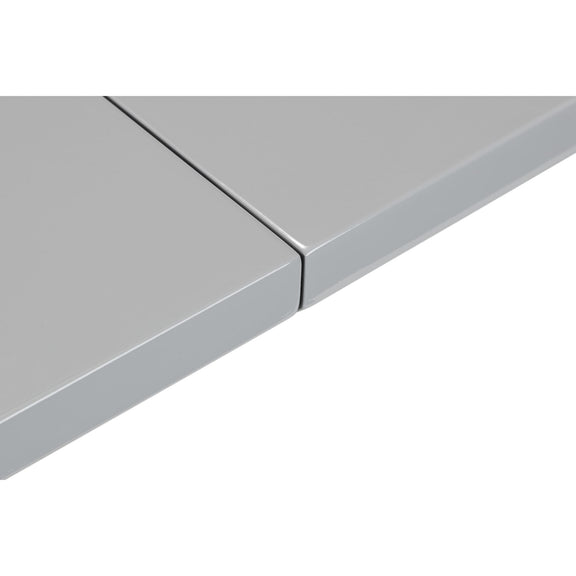Close-up of a gray metal surface with a visible seam