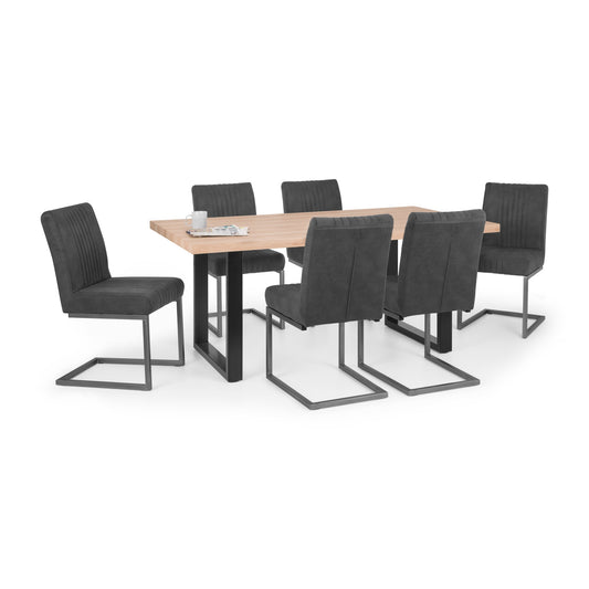 Dining table with six dark gray chairs on a white background