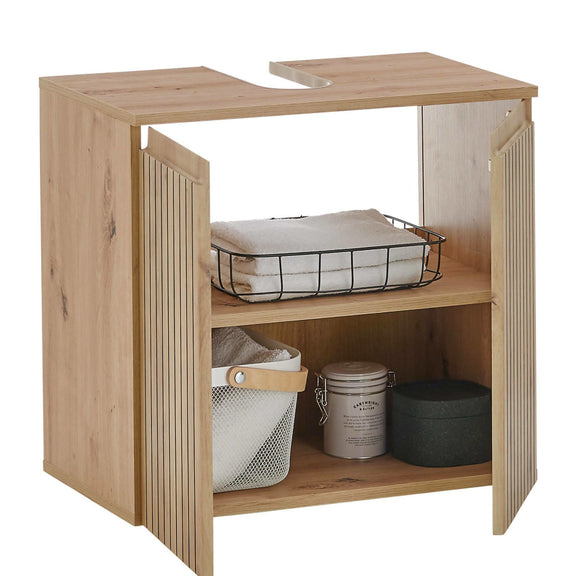 Wooden laundry cabinet with shelves and baskets on a white background