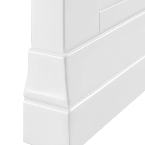 Close-up of white tiles with a subtle pattern on a white background