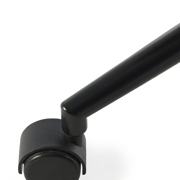 Black metal arm and caster wheel on a white background