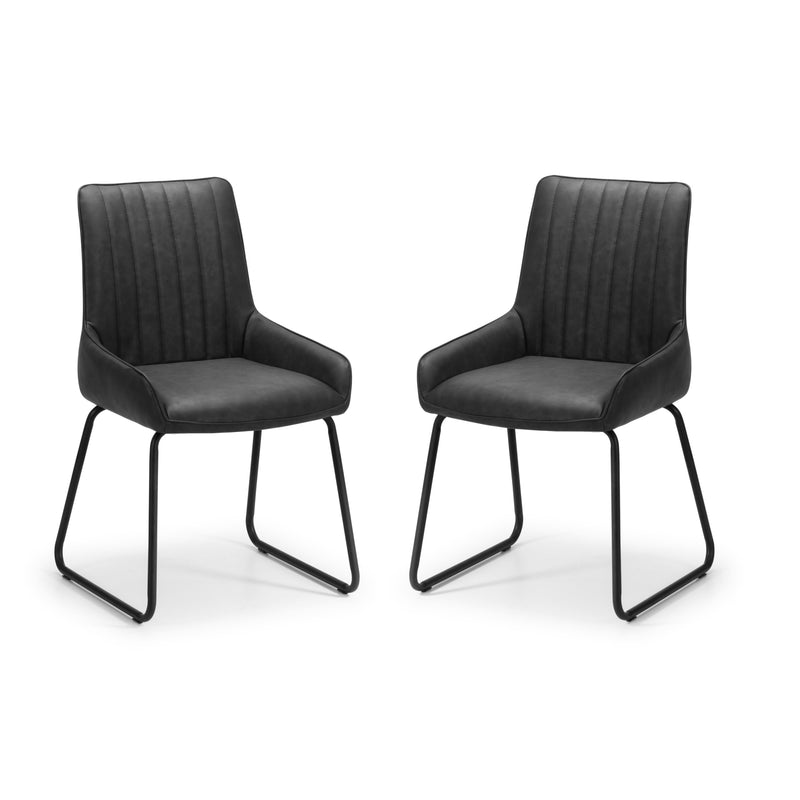 Two black chairs with metal legs on a white background