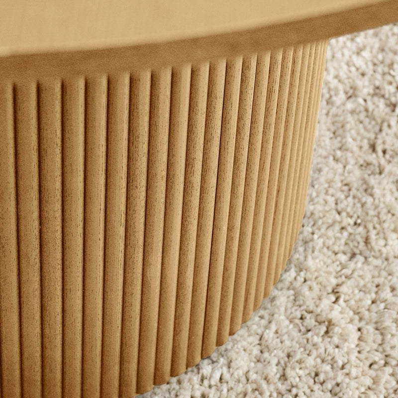 Wooden furniture leg on a carpeted floor