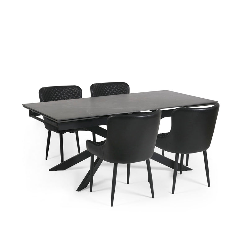 Black dining table with four matching chairs on a white background