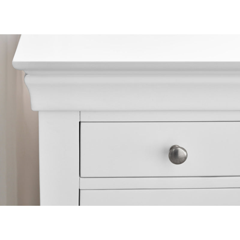White dresser with a silver knob on a white background