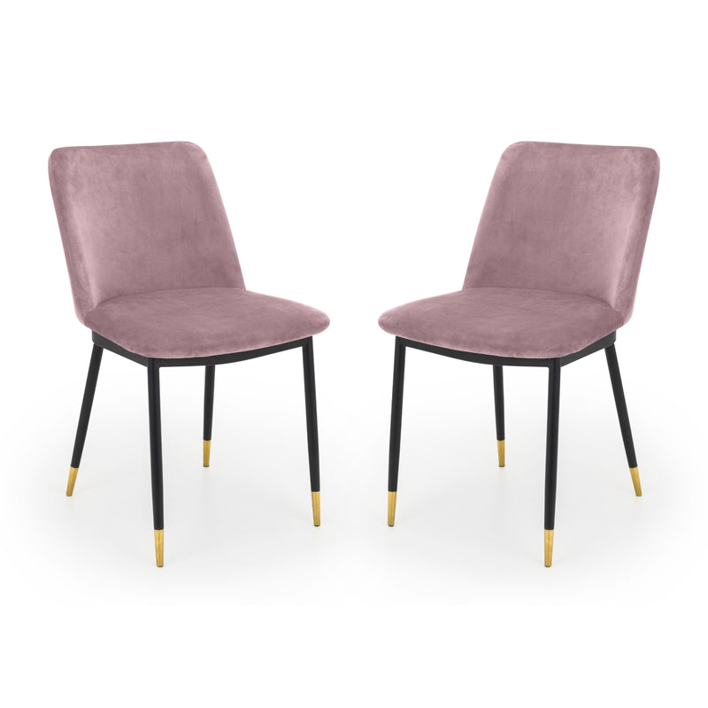 Two purple velvet chairs with black legs on a white background