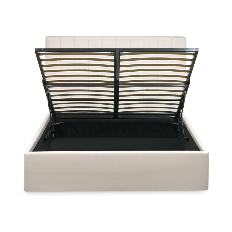 Modern bed with black metal frame and white mattress on a white background