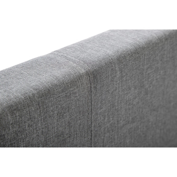 Gray fabric surface with a subtle pattern on a white background