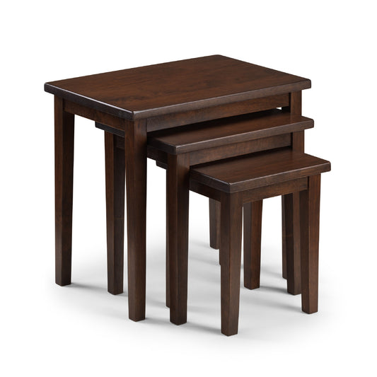 Set of three wooden nesting tables on a white background