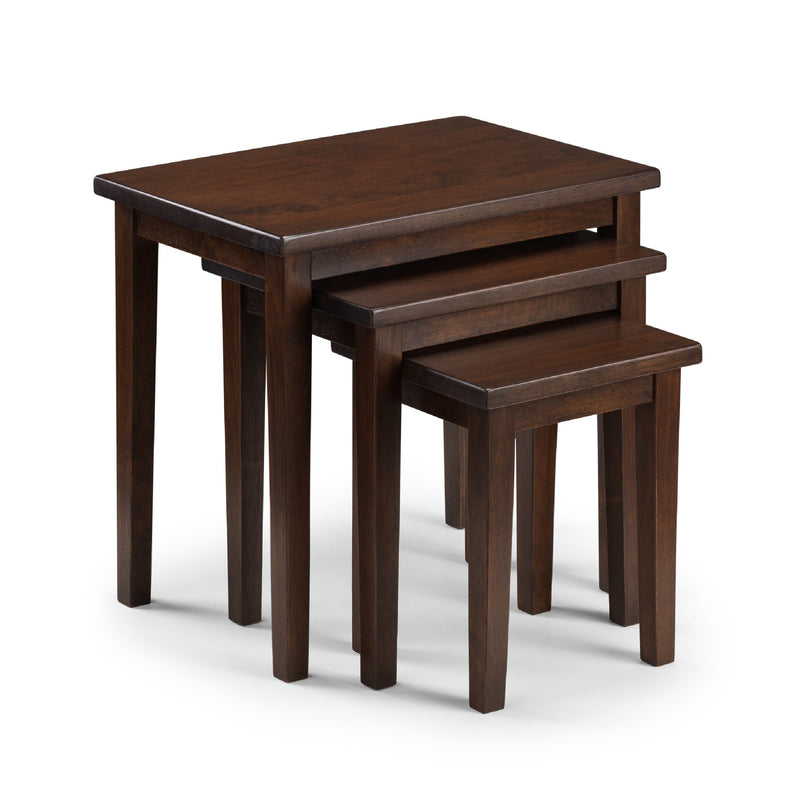 Set of three wooden nesting tables on a white background