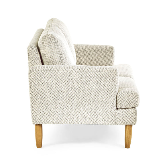 Beige armchair with wooden legs on a white background