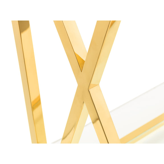 Gold letter 'X' on a white background