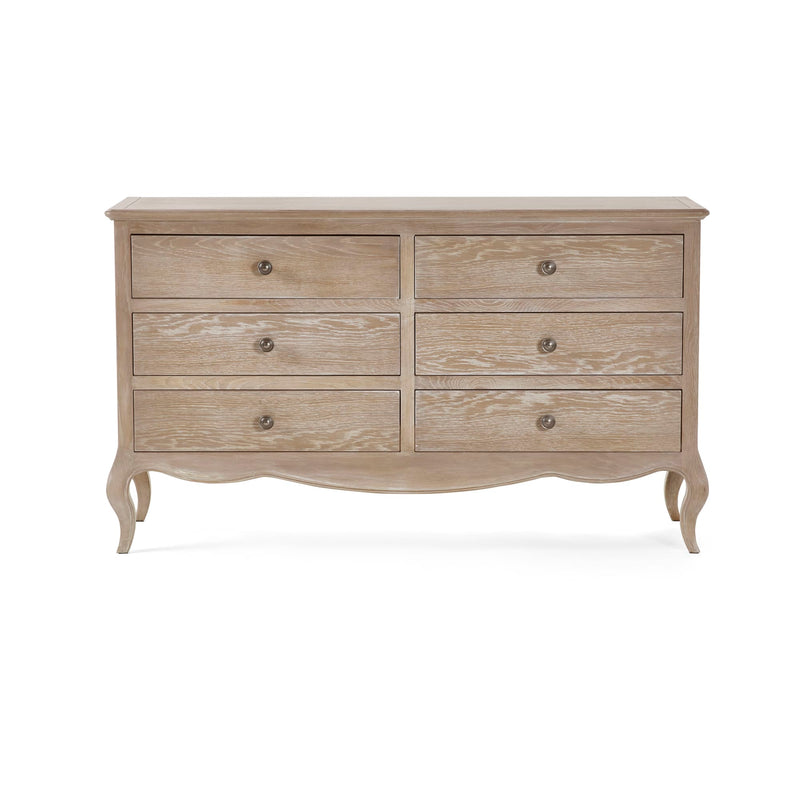 Wooden dresser with six drawers on a white background