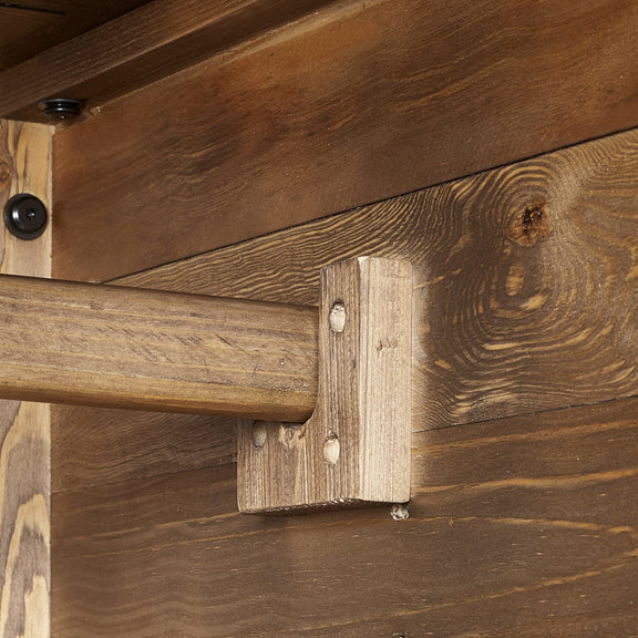 Close-up of wooden beams with a visible joint and screws.
