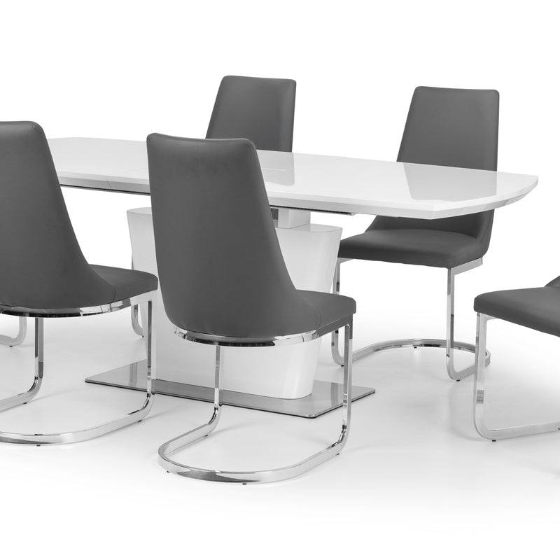 Modern dining table with four gray chairs on a white background
