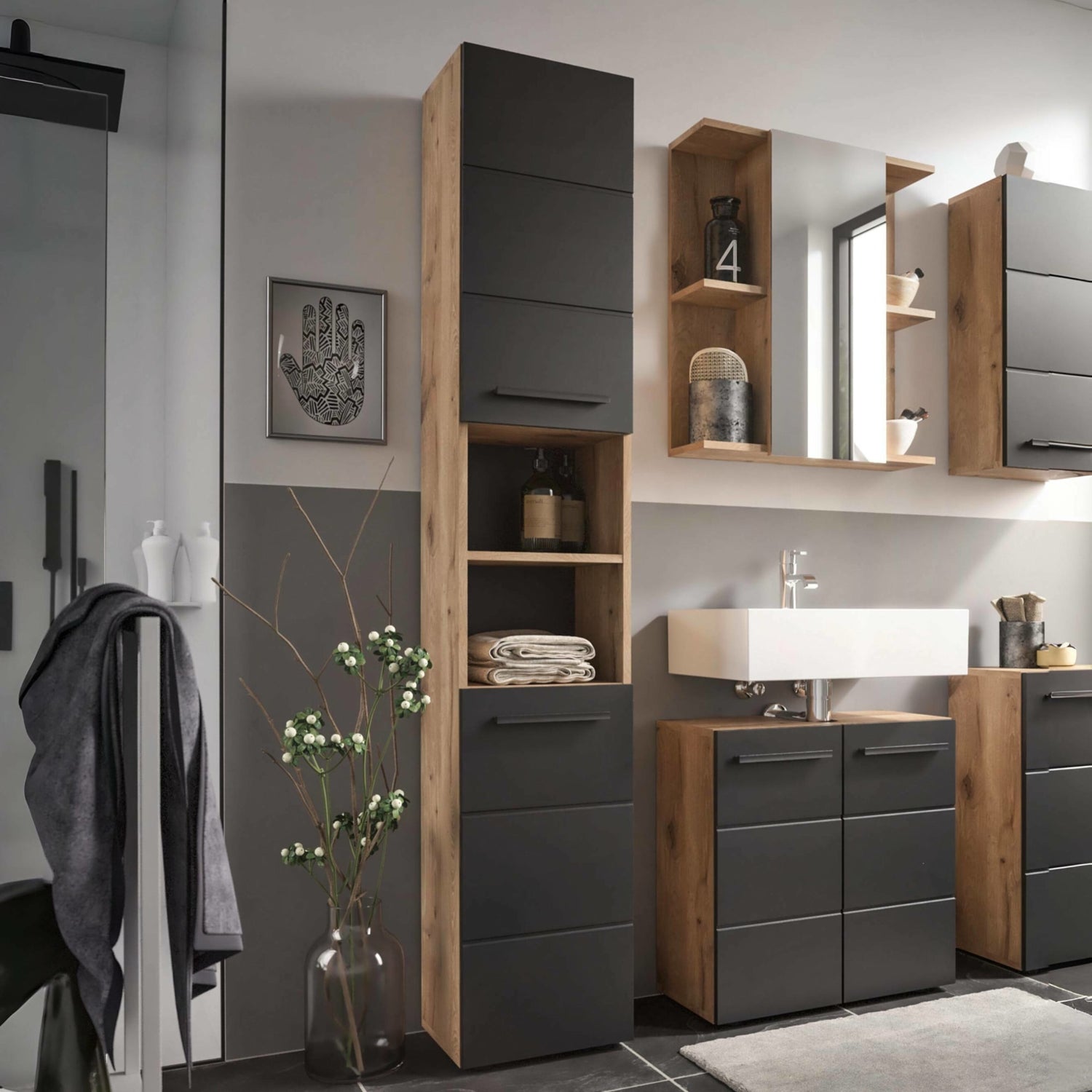 Modern bathroom interior with wooden and gray cabinets, sink, and decorative elements.