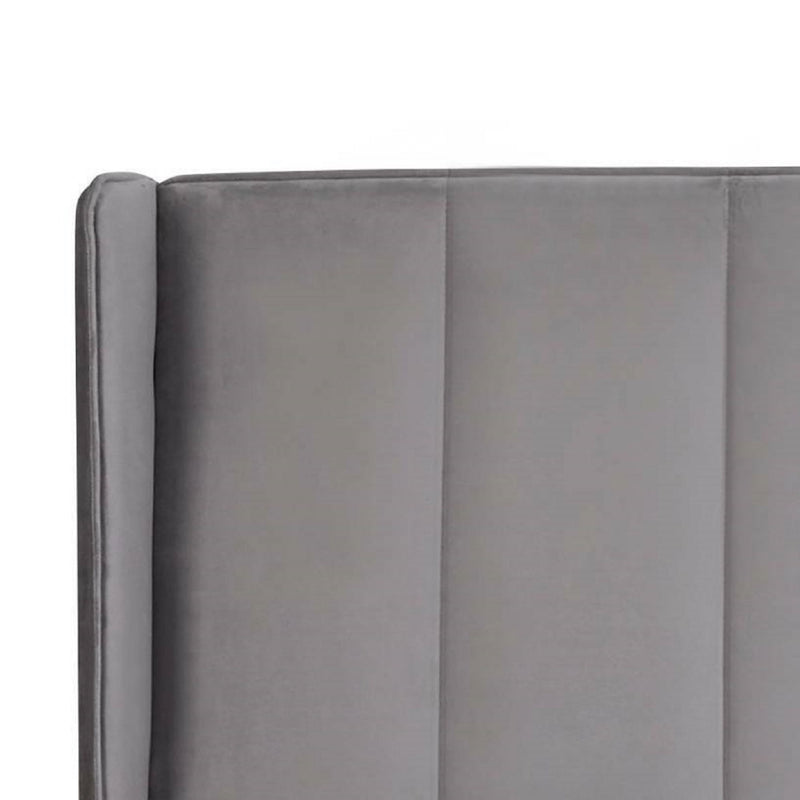 Gray upholstered headboard on a white background