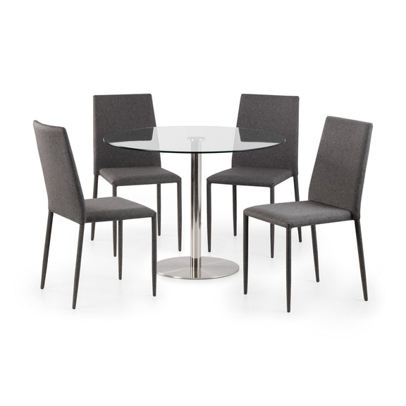 Round glass dining table with four gray chairs on a white background