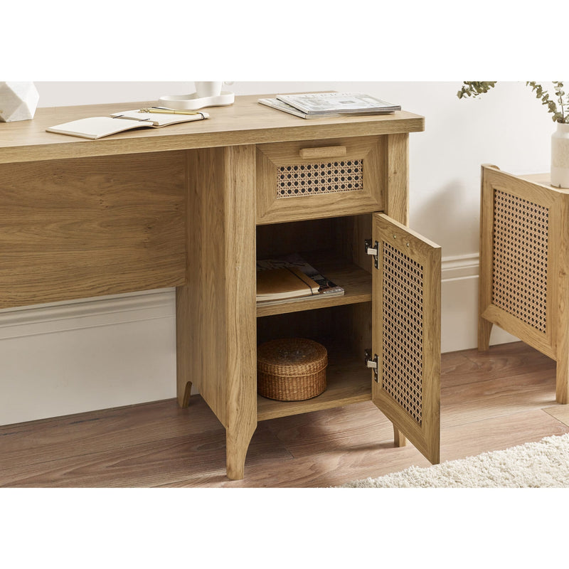 Wooden desk with open cabinet in a room setting