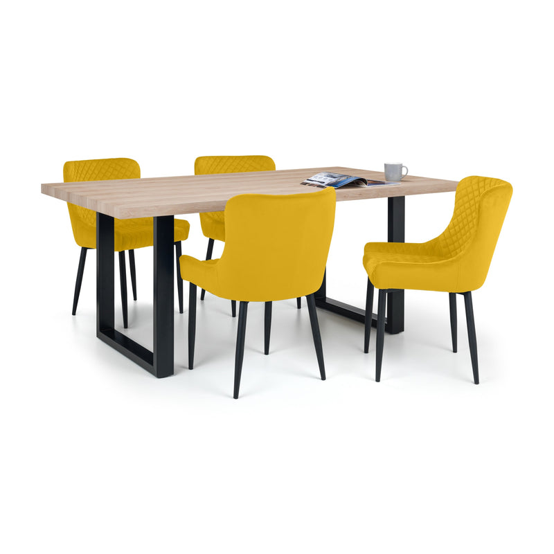 Dining table with four yellow chairs on a white background