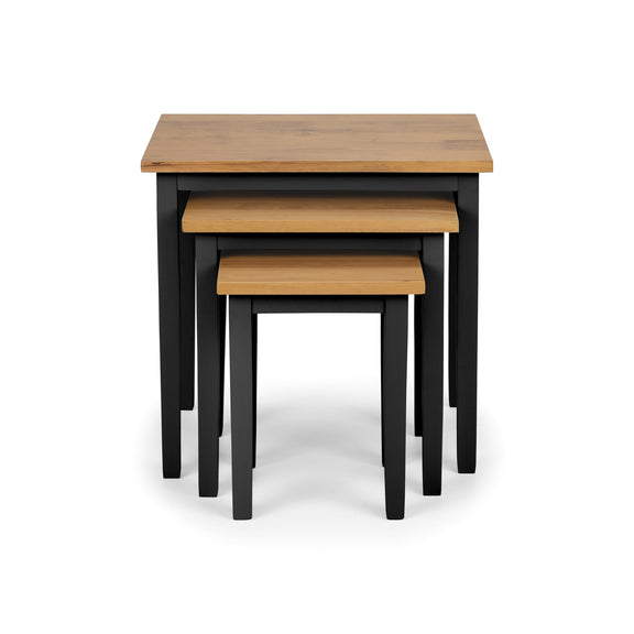 Set of three nesting tables with wooden tops and black legs on a white background